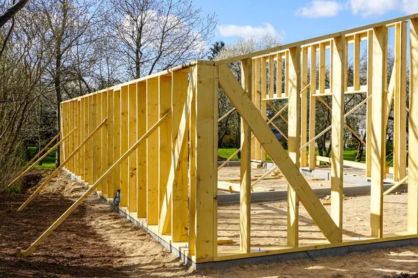 view of a new wooden barn, post and beam construction