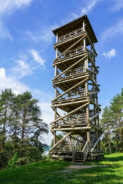 high wooden beams tower for sightseeing on blue sky background