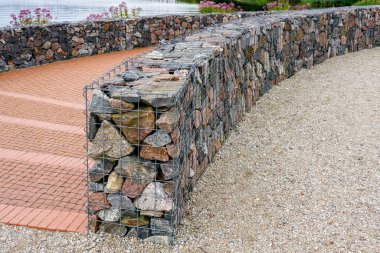 environmental object, gabion fence wall from steel mesh with stones clipart