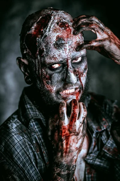 Close up of a creepy scary zombie. Halloween. Horror film.