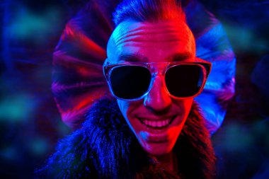 Portrait of a crazy disco man. Party, disco. Colorful light. clipart