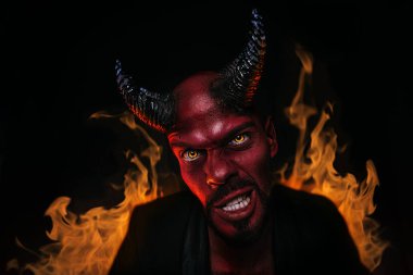 A close-up portrait of a bad demon. Horror movie, nightmare. Halloween. clipart