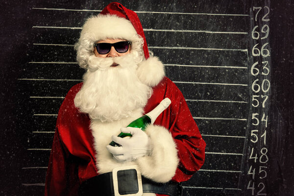 A portrait of criminal Santa Claus in sunglasses. Merry Christmas and Happy New Year!