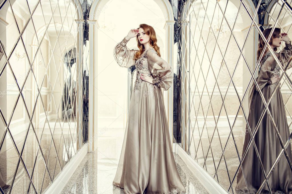 A portrait of a beautiful elegant woman in the fluttering wedding dress. Fashion, wedding dress.