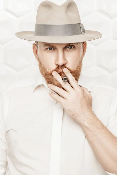 mature man with cigar