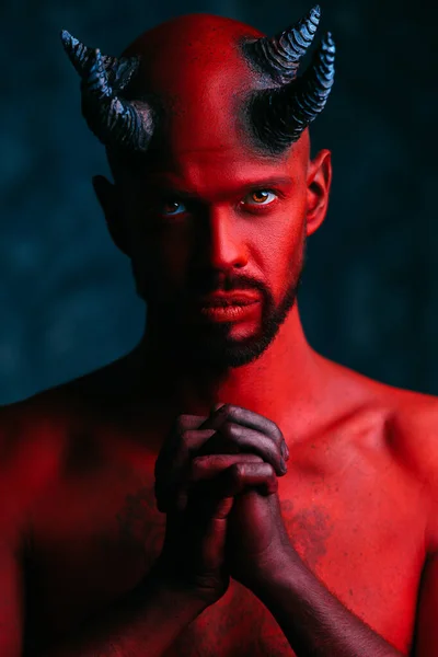 stock image prayers of the red demon