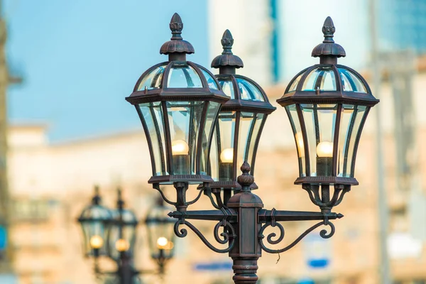 Closeup of vintage metal lantern in the city — Stock Photo, Image