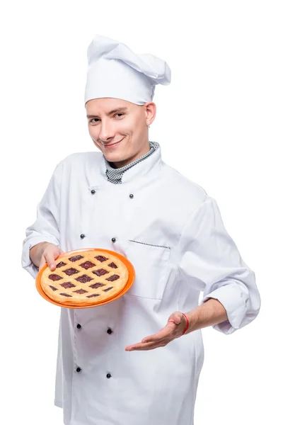 Vertical portrait of a cook with homemade pie, portrait isolated — Stock Photo, Image