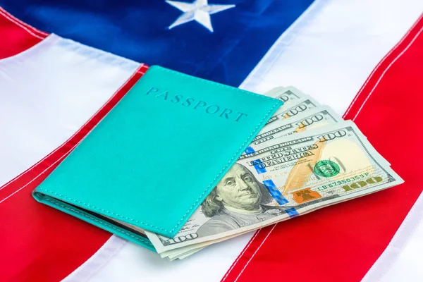 US flag close-up passport stuffed with US dollars — Stock Photo, Image