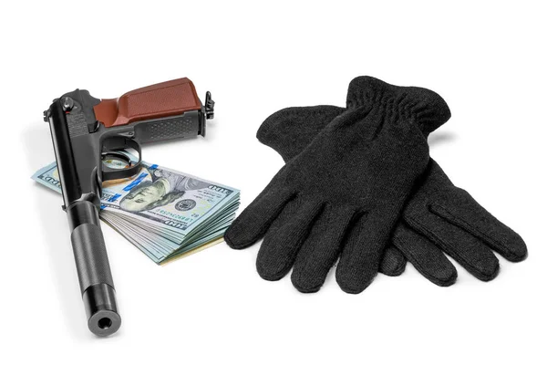Arma com um silenciador, dinheiro e luvas close-up conceito de roubo — Fotografia de Stock