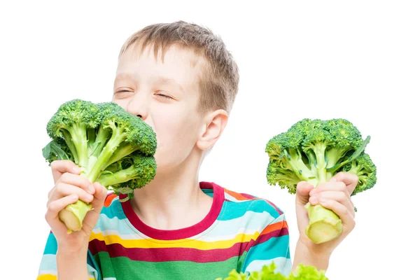 Vegetarian boy with broccoli on white background, portrait isola — Stock Photo, Image