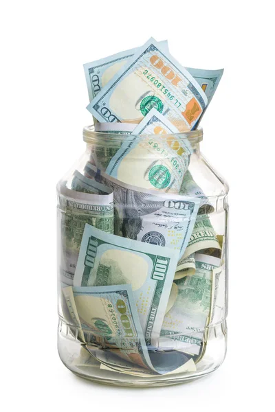 Concepto de ahorro de fotos - un frasco de vidrio lleno de billetes de 100 dólares —  Fotos de Stock