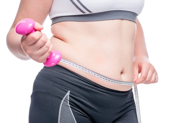 Sports lifestyle striving for the perfect figure, belly closeup — Stock Photo, Image