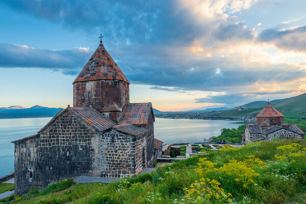 Sevanavank Monastery in the summer at sunset, dramatic sky over 