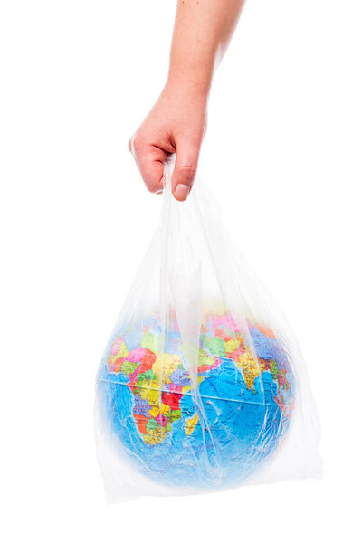 Открытый зонтик оранжевого цвета на белом фоне
