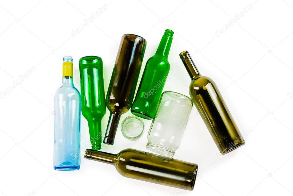 group of glass bottles and jars on white background