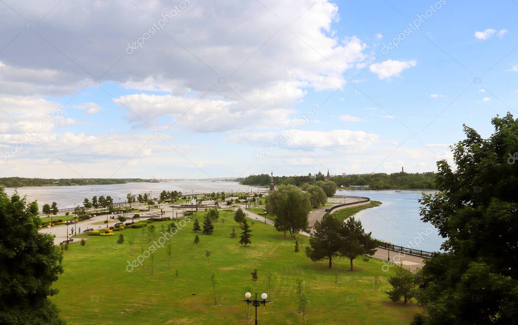 Bright summer day in the Strelka of Yaroslavl Beautiful landscaping of the Park on the embankment of the Volga and Kotorosl in Yaroslavl. the Temple complex in Korovniki