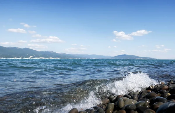 The Hero-City Of Novorossiysk. Tsemess Bay. Sujuk spit. Shiny pebbles on the beach.The Hero-City Of Novorossiysk. Tsemess Bay. Sujuk spit. Shiny pebbles on the beach.