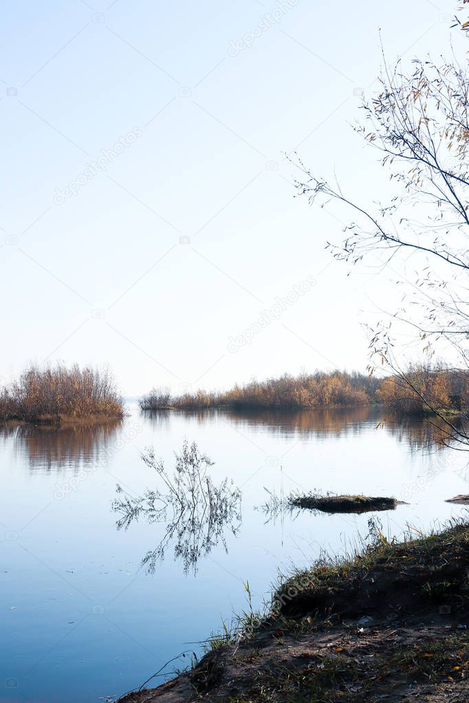 Autumn day in Arkhangelsk. Island Krasnoflotsky. the reflection 