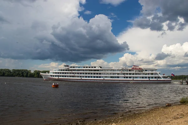 Uglich. Cruise ship on the Volga. Before a storm