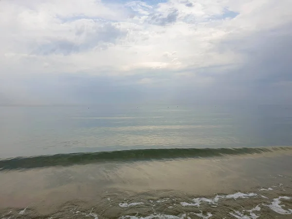 stock image A warm summer morning on the coast of the Black sea. Anapa, Krasnodar region. Calm sea, sunrise