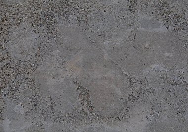 Beton doku. Gri arka plan küçük çatlaklar ile dokulu.