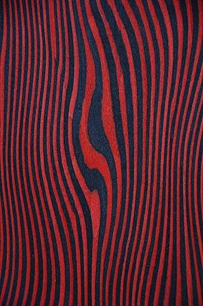 Die Textur Eines Exotischen Holzes Roter Hintergrund Mit Schwarzen Streifen — Stockfoto