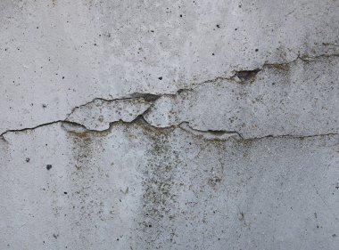 Gri beton doku arka plan. Çatlaklar. Çizikler. Hasar.
