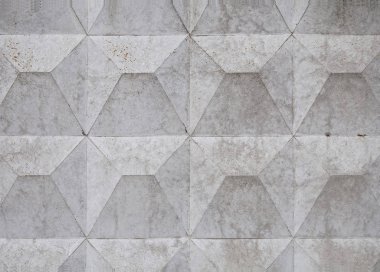 Gri arka plan ve doku bir Beton çit. Geometri kareler beton.