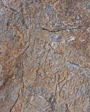 Doku ve arka plan taş. Gri sarımsı renkli.