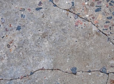 Doku eski beton. Çatlak ve hasar. Gri beton zemin.