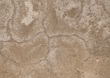 Kaba sıva duvar, büyük bir çatlak üzerinde. Çimento zemin dokusu. Çimento ve alçı, arka plan tasarımı için büyük çatlaklar ile.