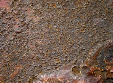 Arka plan doku eski paslı bozuk metal. Bir saç çok renkli boya kalıntıları.