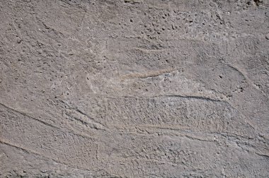 Gri beton textures arka plan. Çatlaklar. Çizikler. Hasar. Taş duvar arka plan kırık.