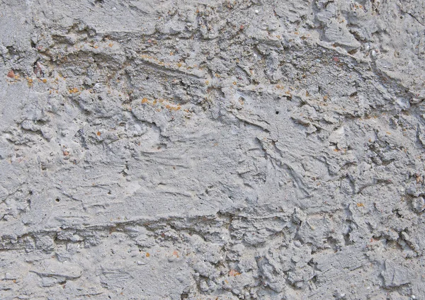 Szürke beton textúra a háttér. Kár. Repedt a kőfal hátteret. — Stock Fotó