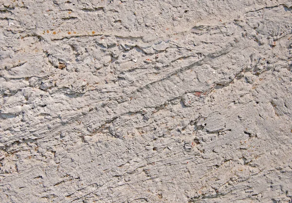 灰色コンクリート テクスチャ背景。損傷。割れた石の壁の背景. — ストック写真