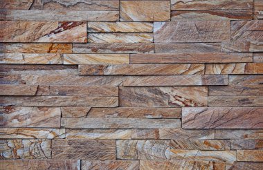 Bir taşın arka plan dokuları. Dekoratif ön taş.