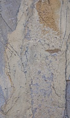 Gri beton textures arka plan. Çatlaklar. Çizikler. Hasar. Taş duvar arka plan kırık