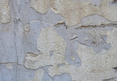 Gri beton textures arka plan. Çatlaklar. Çizikler. Hasar. Taş duvar arka plan kırık