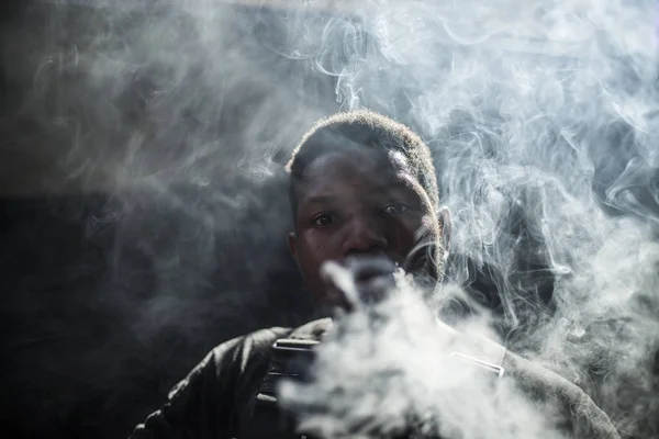 Afro man smoke — Stock Photo, Image