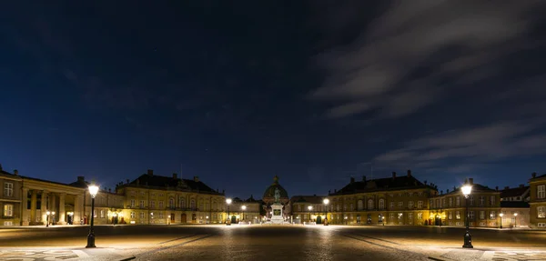 Amalienborg, the palace and residence in Copenhagen of the queen of Denmark by night.