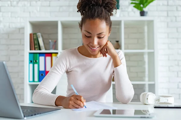 Closeup student girl during writing with pen on a paper, concept education — Stock Photo, Image