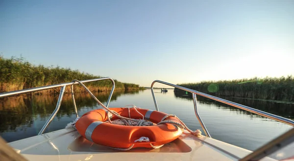 sunset in the Danube delta Romania.Beautiful blueish lights in water.Beautiful sunset landscape from the Danube Delta Biosphere Reserve in Romania