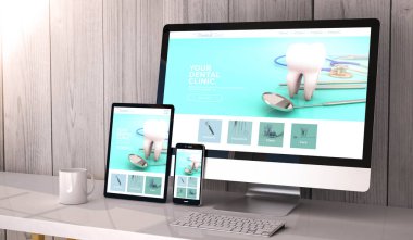 Dijital cihazlar ekranda masaüstü, duyarlı diş kliniği Web sitesi tasarımı üzerinde oluşturulan