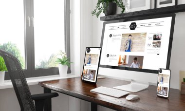 Siyah ve beyaz masaüstü blog gösteren üç cihazlar ile 