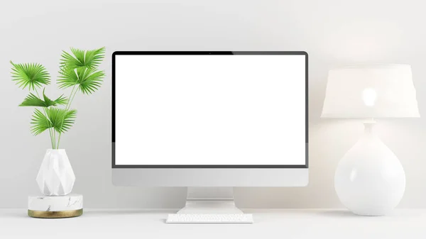 Computer mock up on minimal desktop with plant and lamp 3d rendering