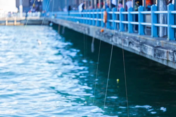 Fishing strings on Galata bridge — Stock Photo, Image