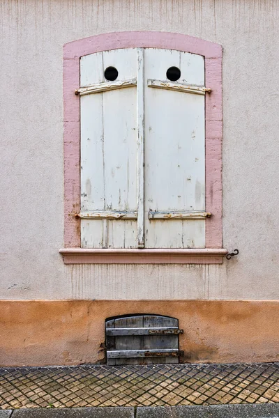 Closed window by wooden shutter — Stock Photo, Image