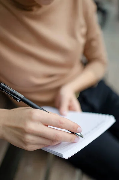 stock image business woman looking documents with pen in hand