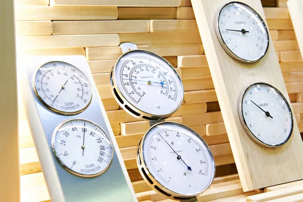 Thermometers and hygrometers for sauna baths in store — Stock Image Thermometers Hygrometers Sauna Baths Store Royalty Free Stock Photos